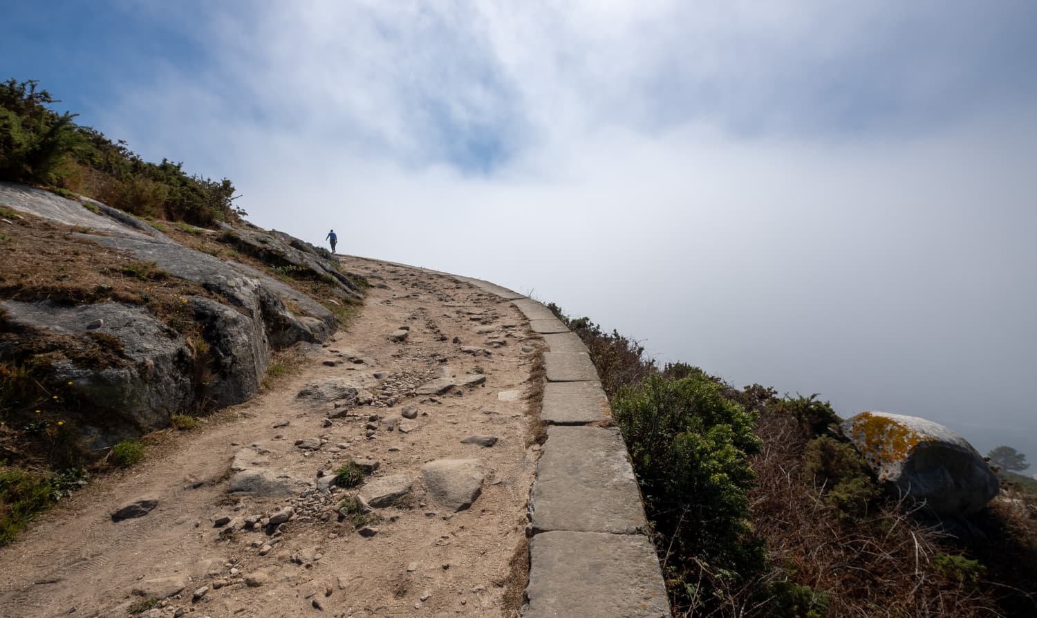 The stone path climbing to the lighthouse on the Cíes Islands