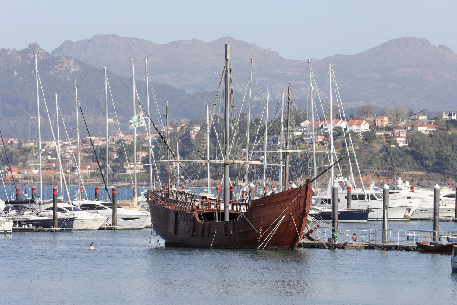 The replica of the caravel La Pinta among the yachts in Baiona’s marina
